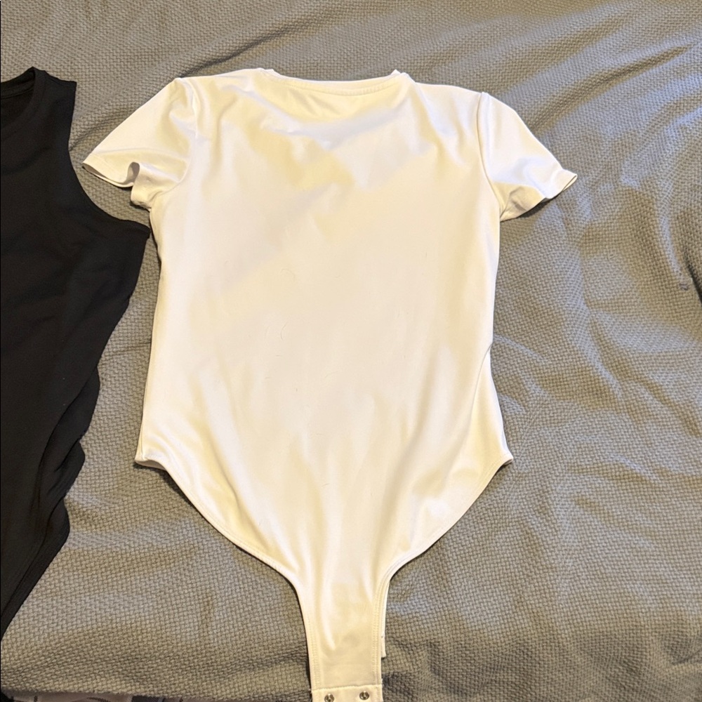 Black and White body suits - Picture 6 of 9